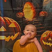 Freya joined the competition — help win amazing prizes! baby, pumpkin, jack_o_lantern, halloween, cute, smiling, autumn_leaves, orange, festive, holiday, glowing_lights, child, portrait, costume, seasonal, decor, background, happy, sitting, holiday_theme