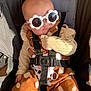 Freya joined the competition — help win amazing prizes! baby, child, sunglasses, flower_shaped, stroller, seatbelt, polka_dot, clothing, sitting, sunlight, cute, fashion, infant, casual, headwear, portrait, warm_colors, relaxed, outdoor, baby_fashion