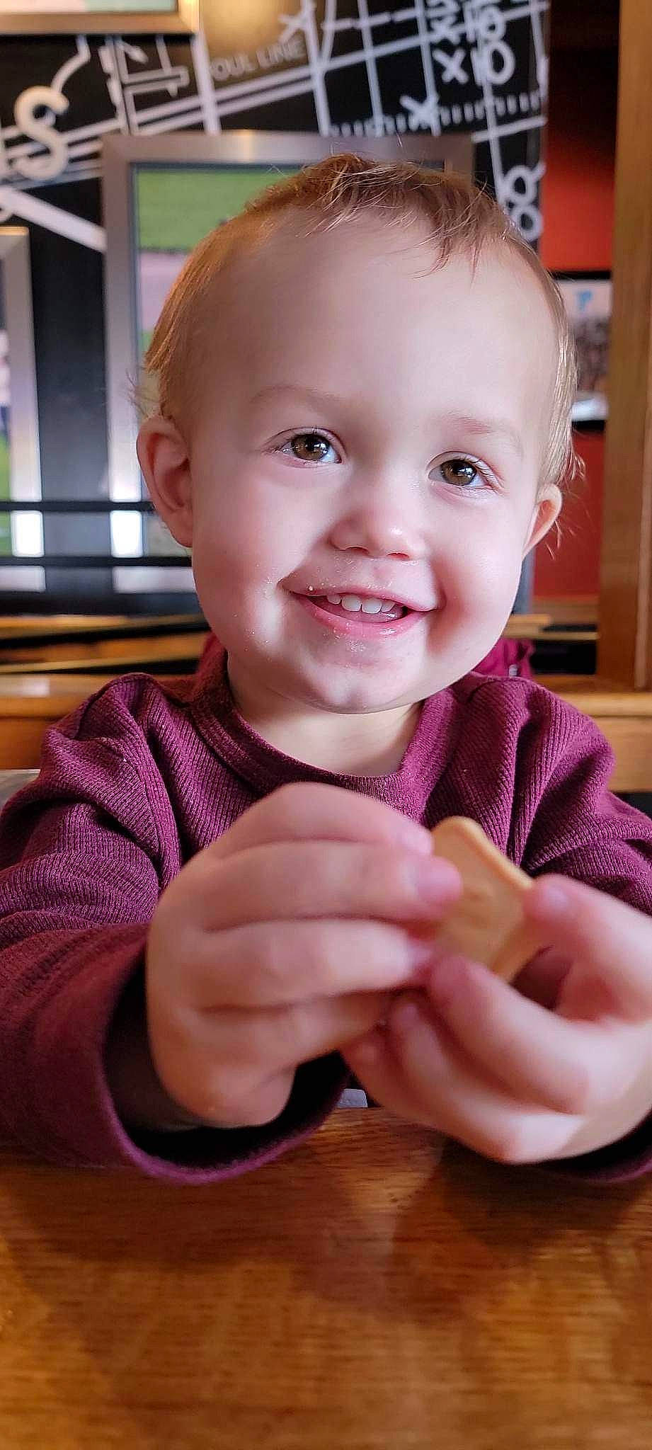 Liam is registered to the contest to win money with this photo: baby_toddler_clothing, cheek, child, ear, finger, fun, gesture, happy, iris, joy, lip, mouth, nail, nose, person, pink, skin, sleeve, smile, thumb