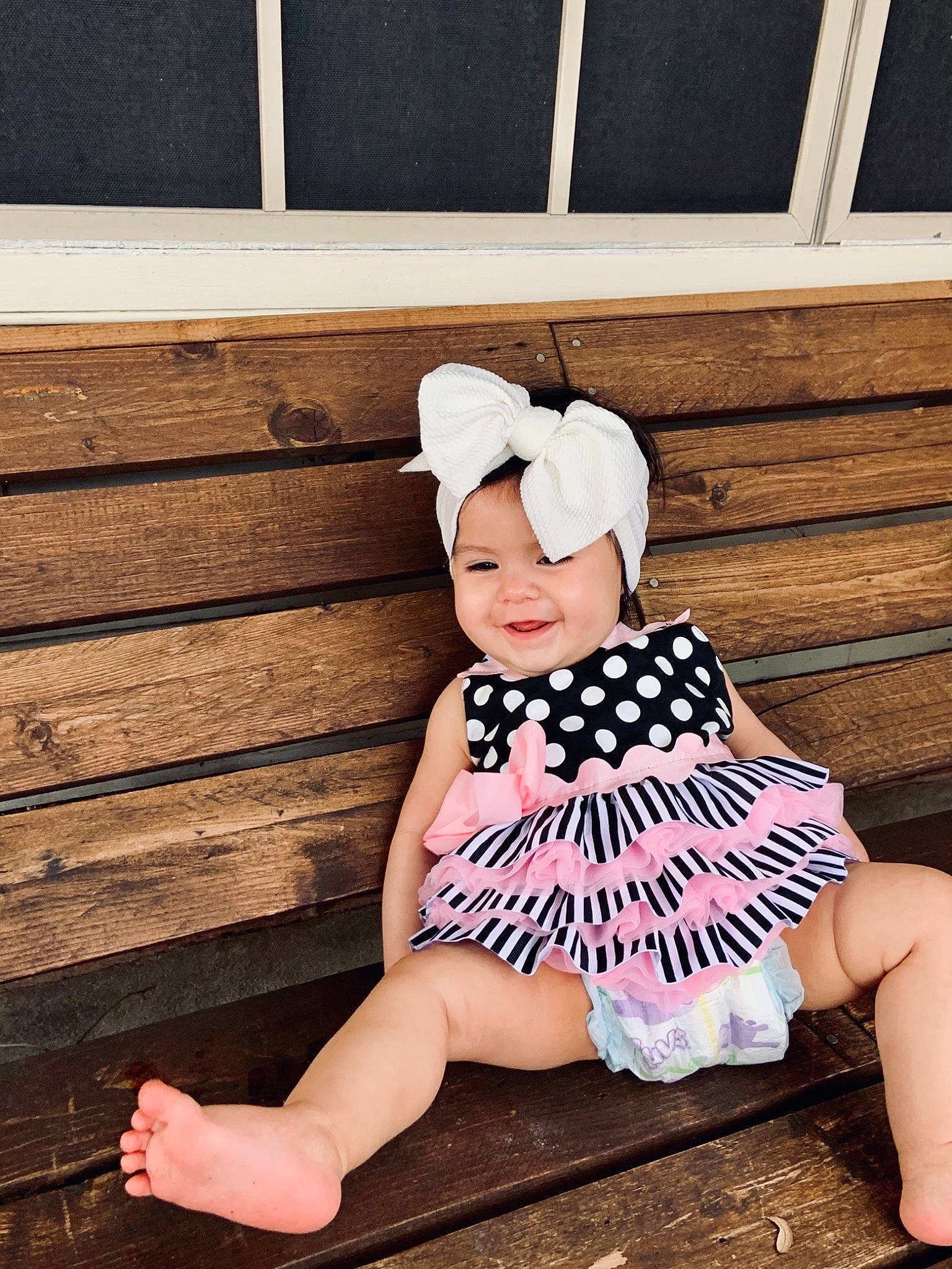 Jaslynn is registered to the contest to win money with this photo: baby_bloomers, baby_toddler_clothing, cap, child, child_model, clothing, costume, costume_accessory, design, dress, headband, headgear, headwear, joy, pattern, person, pink, polka_dot, sitting, toddler