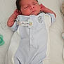 Antonio a rejoint le concours — aidez-le/la à gagner de superbes lots ! baby, newborn, sleeping, infant, pacifier, clothing, light_blue, white, soft, bed, cute, peaceful, hands_up, lying_down, indoors, child, person, small, adorable, resting