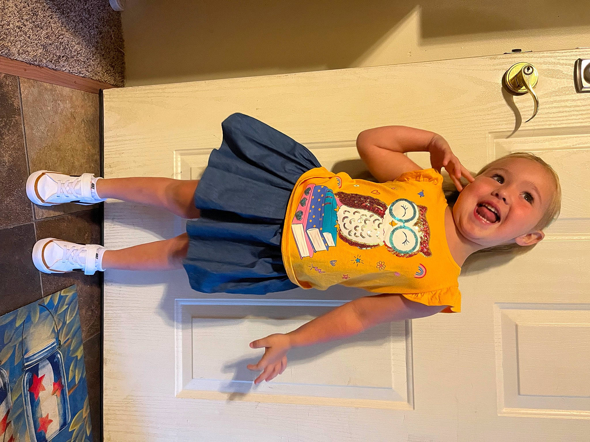 Emma Grace is registered to the contest to win money with this photo: baby_laughing, baby_toddler_clothing, child, elbow, electric_blue, fun, happy, human_leg, knee, person, room, sleeve, smile, t_shirt, thigh, toddler, vacation, waist, wrist