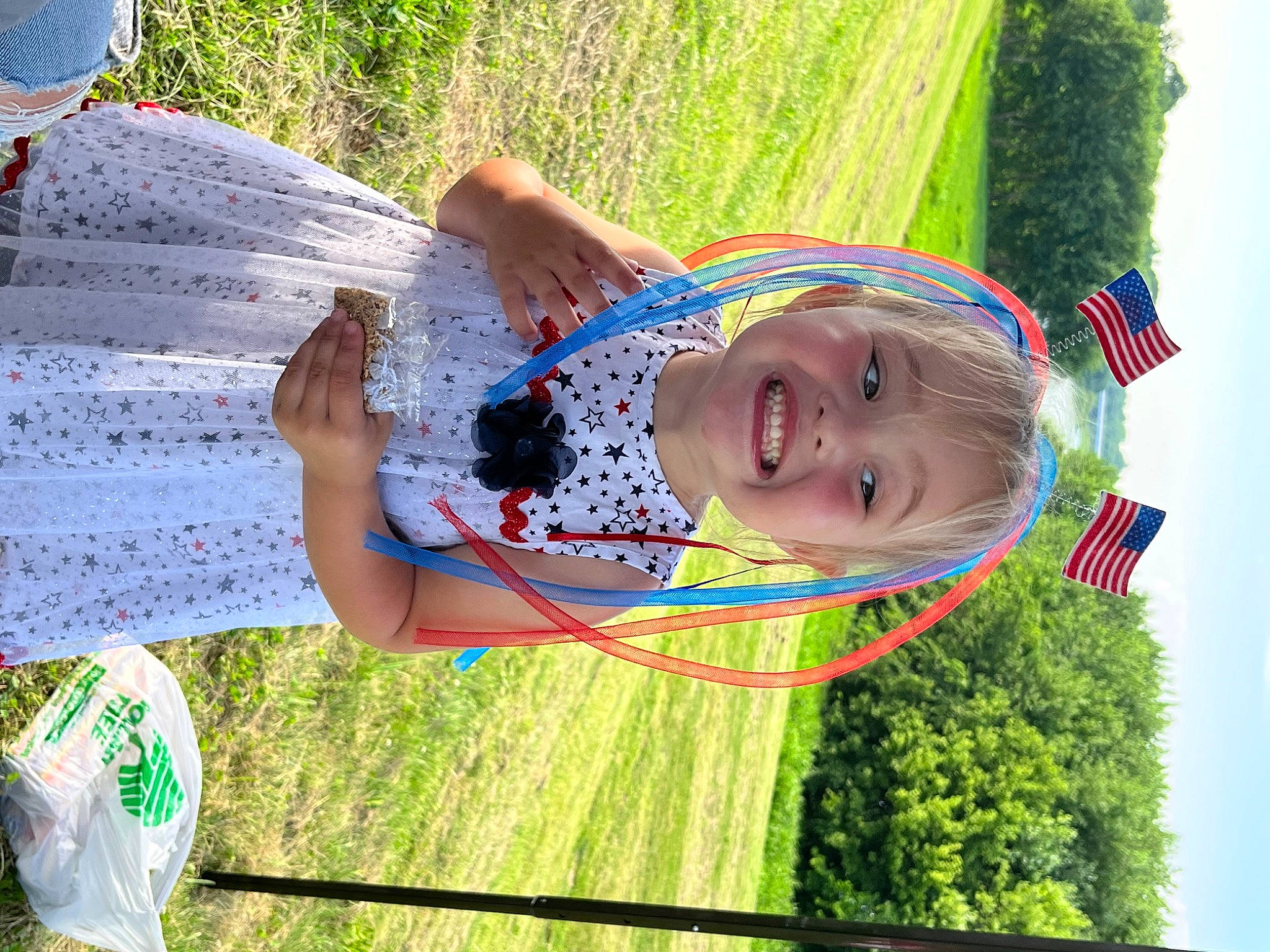 Emma Grace joined the competition — help win amazing prizes! child, event, fun, grass, grassland, green, happy, hat, joy, leisure, pattern, people_in_nature, person, plant, pole, recreation, sky, smile, toddler, travel