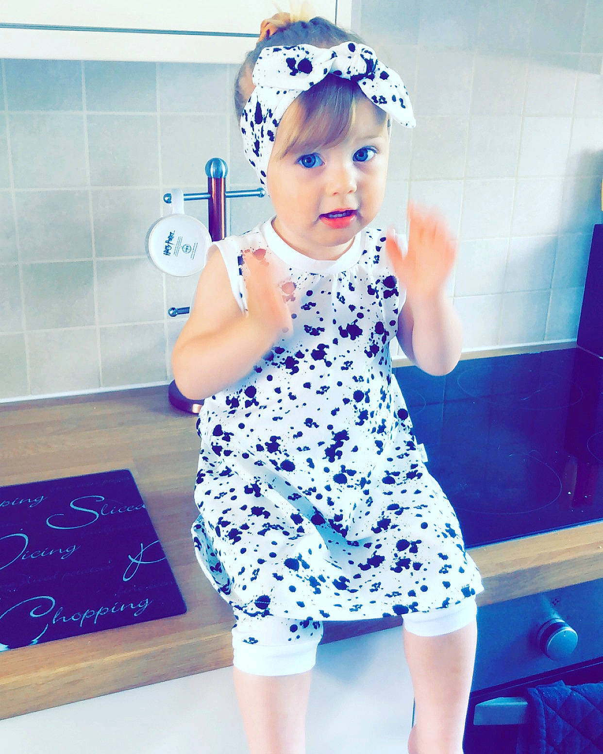 Nyah joined the competition — help win amazing prizes! azure, baby_toddler_clothing, blue, day_dress, dress, fashion_design, happy, hat, headwear, magenta, neck, one_piece_garment, person, pink, purple, shoulder, sleeve, standing, street_fashion, textile