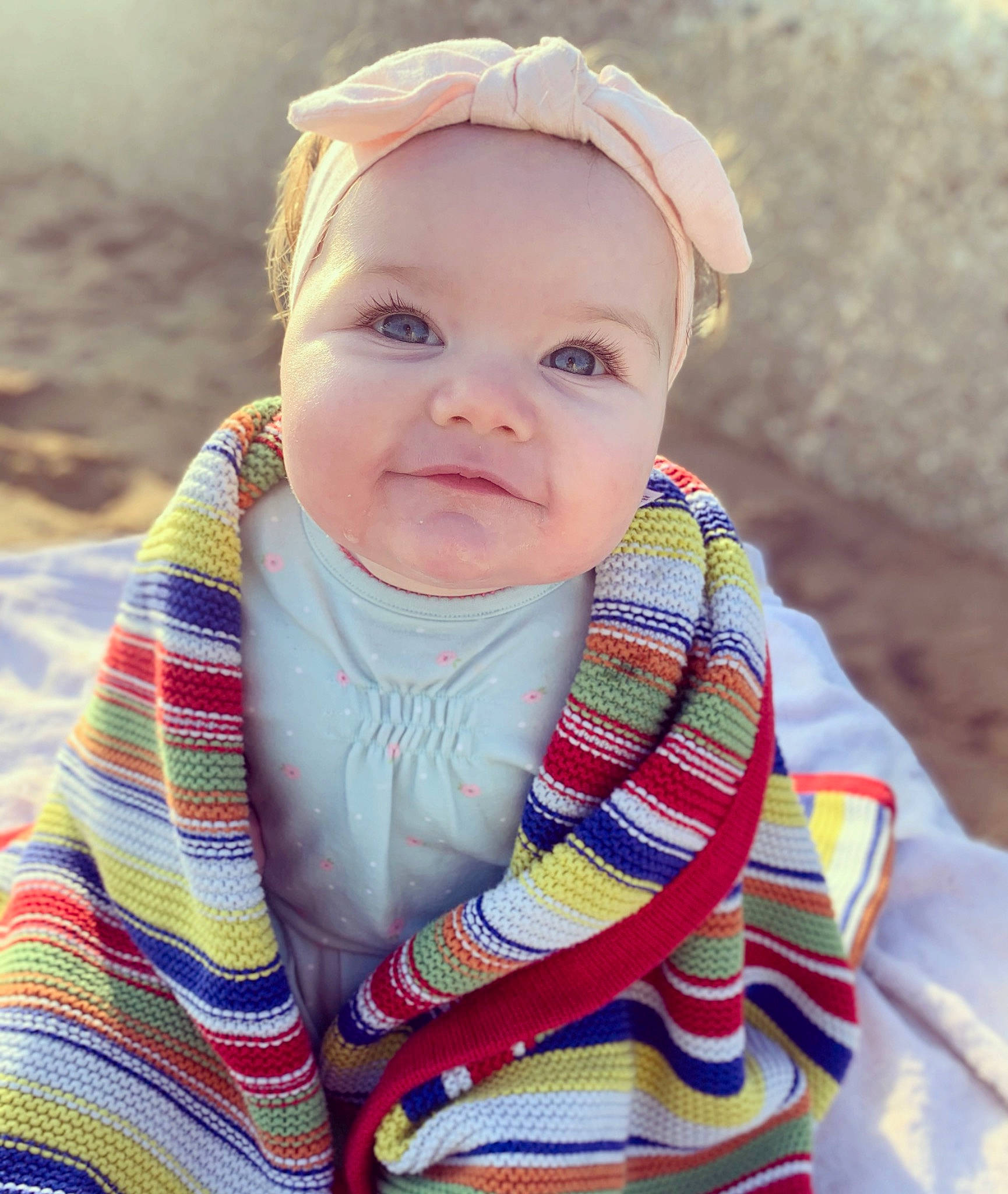 Avah is registered to the contest to win money with this photo: baby, baby_toddler_clothing, child, dress, eye, face, grass, happy, hat, head, headwear, iris, lip, pattern, person, plaid, skin, sleeve, smile, tartan