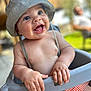 baby, child, hat, smile, happy, high_chair, outdoor, summer, chubby_hands, skin, closeup, person, expression, cute, infant, sunlight, blurred_background, clothing, seat, fun