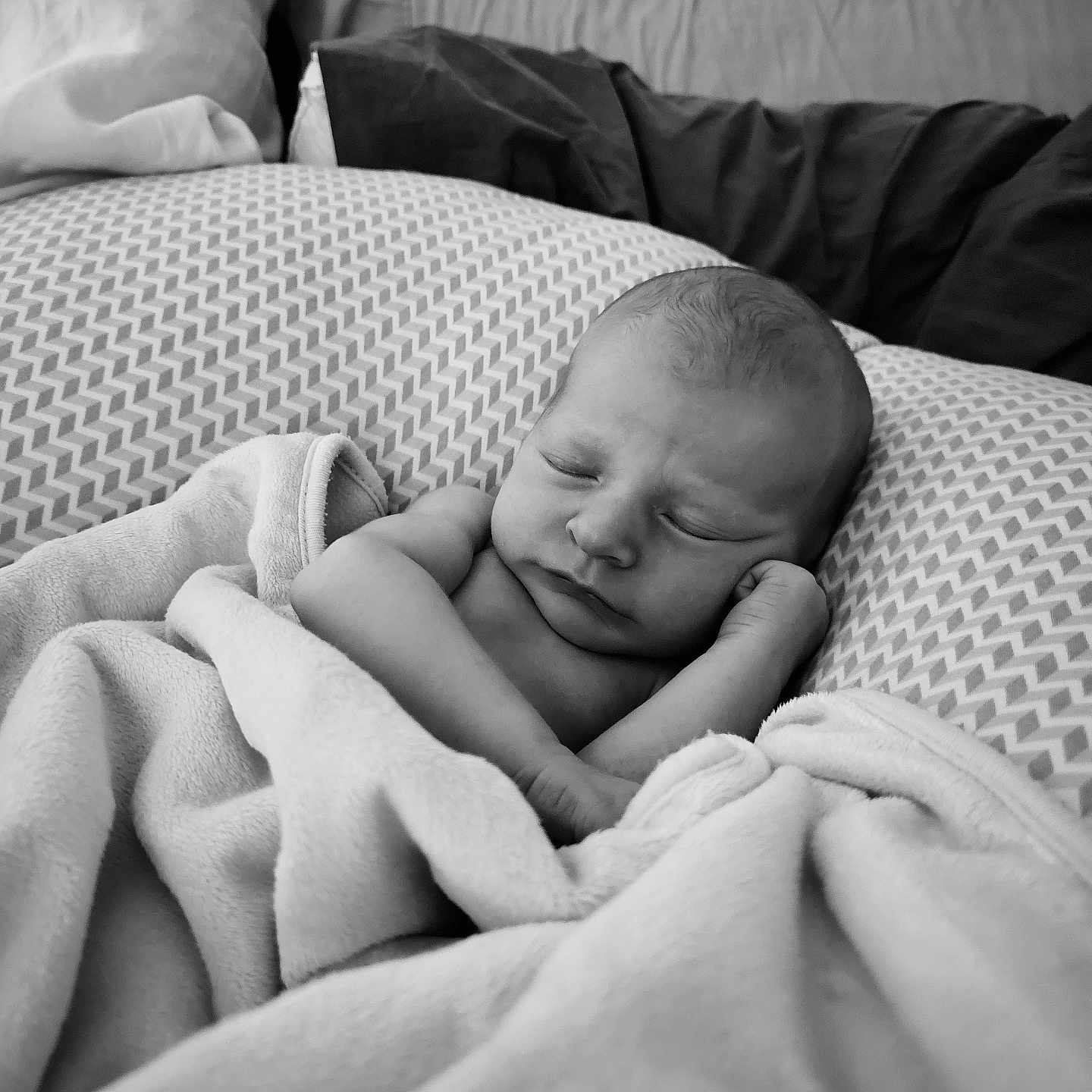 Jagger is registered to the contest to win money with this photo: architecture, baby, bed, bedroom, blanket, bodypart, building, clothing, couch, cushion, face, finger, furniture, glove, hand, happy, head, homedecor, hospital, indoors