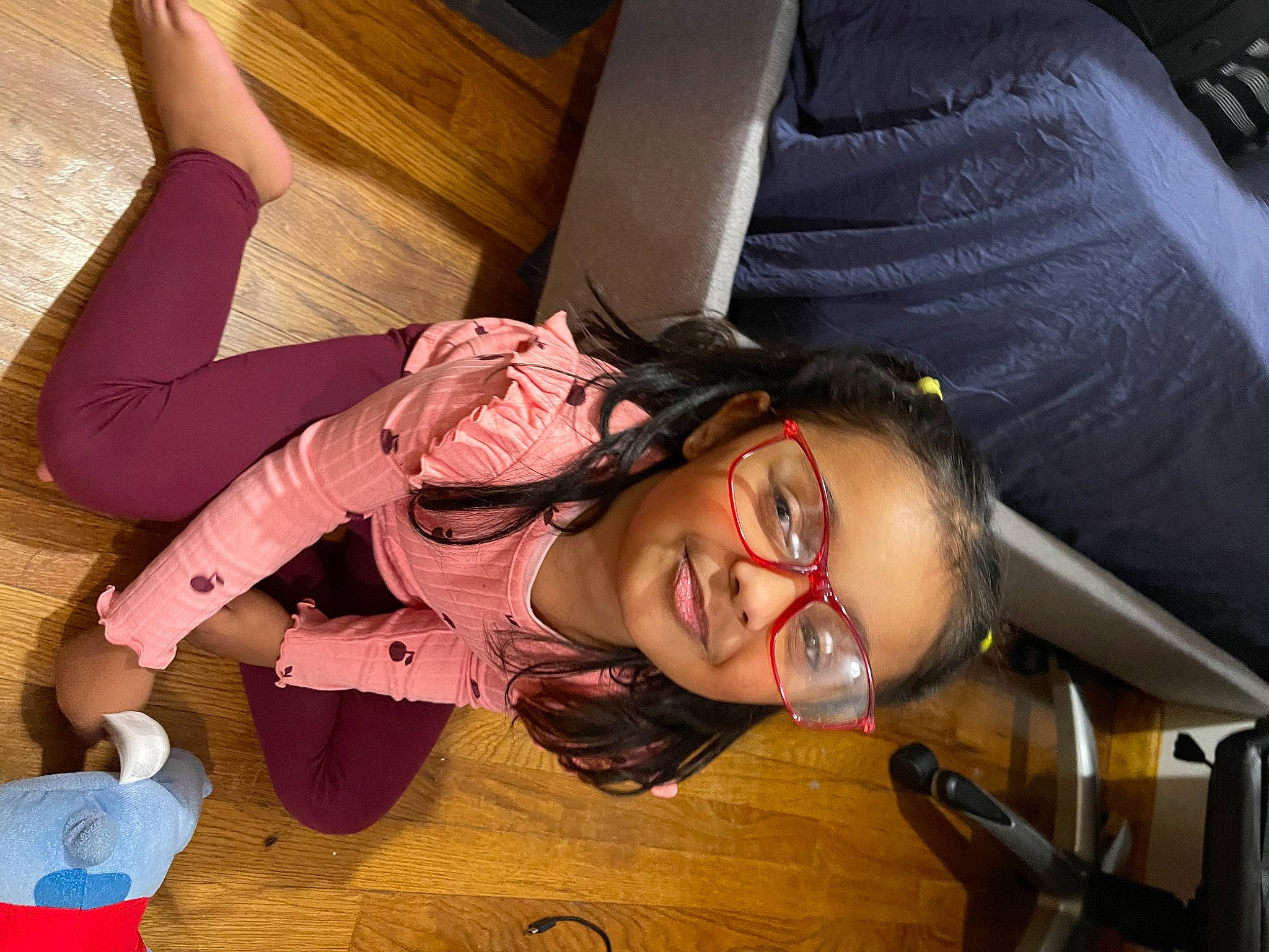 Christalyn is registered to the contest to win money with this photo: audio_equipment, automotive_design, bangs, child, comfort, costume, eyewear, flooring, fun, happy, head, human_leg, joy, knee, long_hair, mouth, person, sitting, smile, thigh