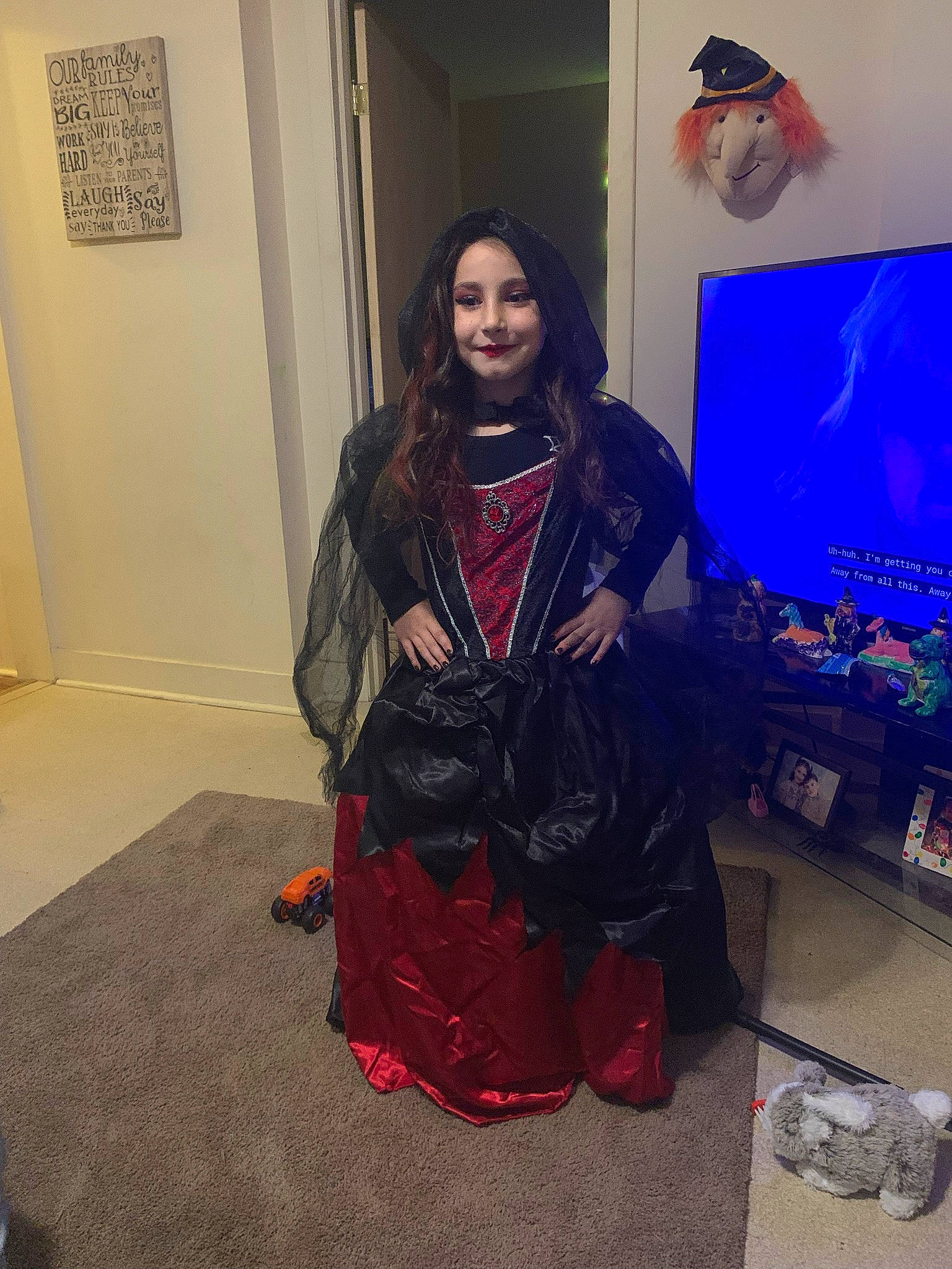 Genevieve joined the competition — help win amazing prizes! bag, black_hair, boot, costume, door, electric_blue, event, fashion_design, flooring, formal_wear, fun, jewellery, joy, long_hair, luggage_and_bags, magenta, person, picture_frame, scarf, smile