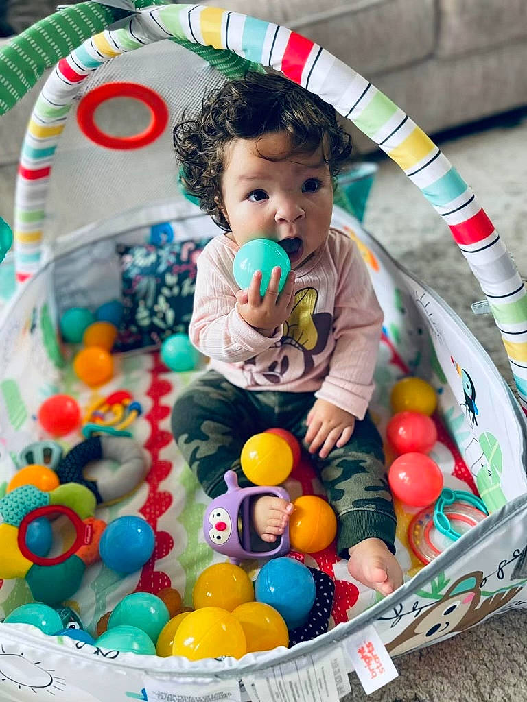 Keziah is registered to the contest to win money with this photo: baby, baby_products, baby_toddler_clothing, baby_toys, basket, child, confectionery, event, food, fun, holiday, mammal, person, play, product, sitting, stuffed_toy, surprise, sweetness, toddler