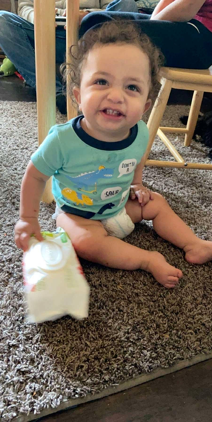 Brenden is registered to the contest to win money with this photo: baby, child, fun, person, play, sitting, smile, toddler