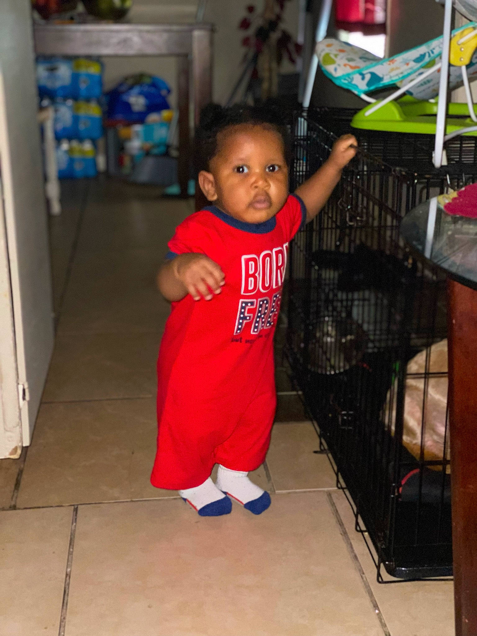 Kevionce is registered to the contest to win money with this photo: baby, baby_toddler_clothing, child, floor, flooring, fun, happy, joint, leisure, person, refrigerator, room, shelf, shoulder, skin, sleeve, standing, t_shirt, thumb, toddler