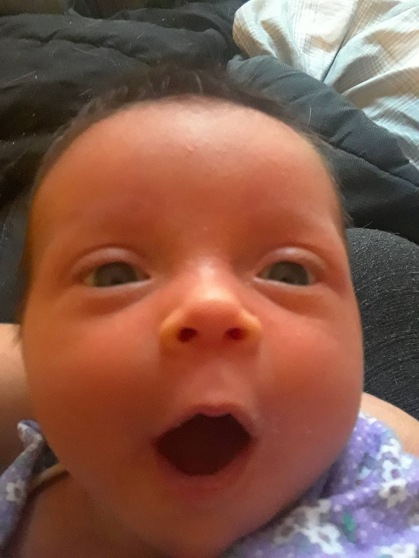 Addyson is registered to the contest to win money with this photo: cheek, child, chin, close_up, ear, eye, eyebrow, face, finger, forehead, hand, head, infant, laughter, lip, mouth, nose, person, skin, smile