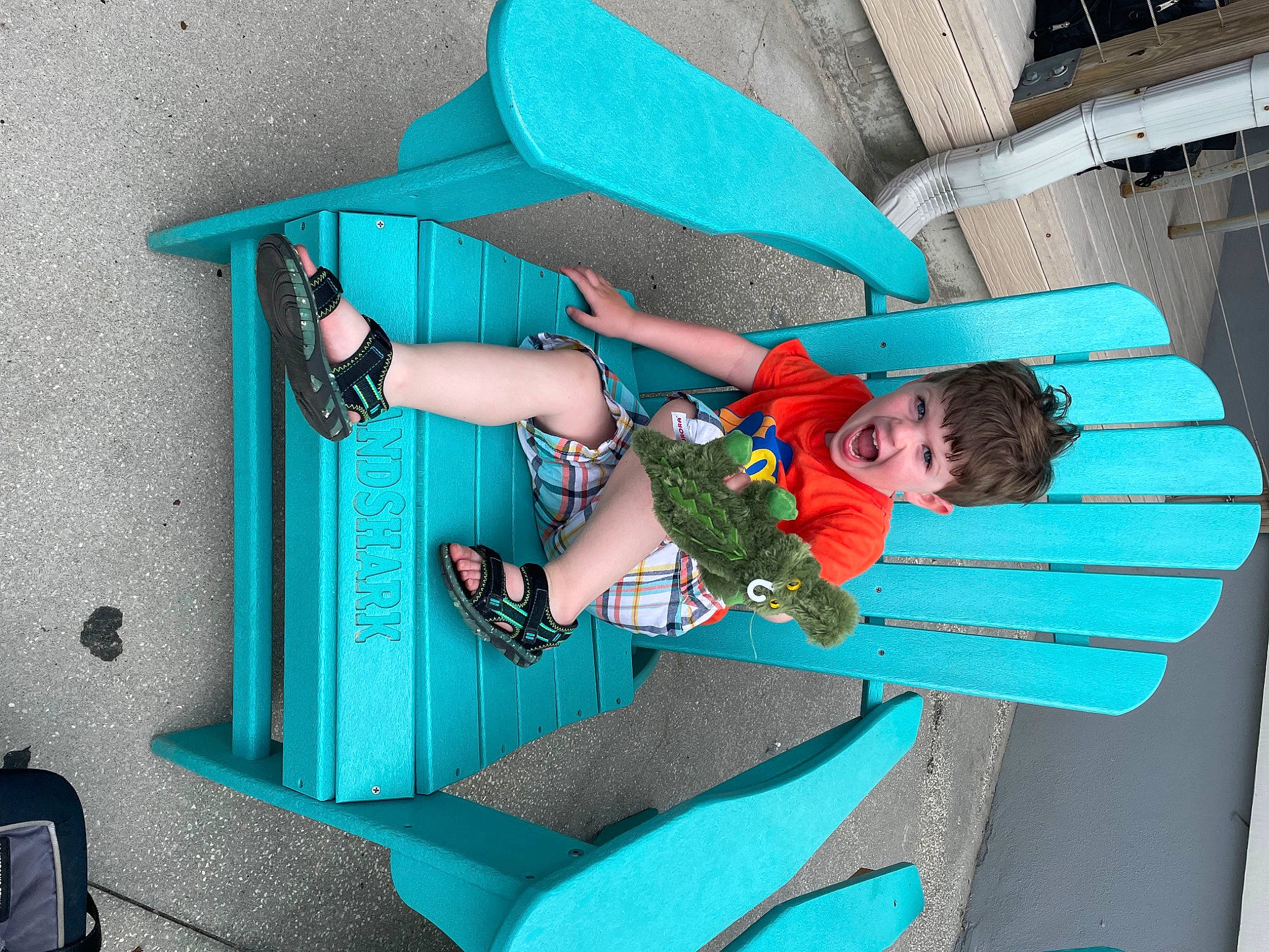 Eli joined the competition — help win amazing prizes! aqua, azure, bag, blue, electric_blue, eyewear, fashion_accessory, fun, green, human_leg, knee, leg, leisure, luggage_and_bags, person, sandal, sitting, stairs, street_fashion, thigh