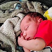 Levi joined the competition — help win amazing prizes! baby, newborn, sleeping, blanket, clothing, bottle, infant, face, hand, rest, red_shirt, cozy, soft, cute, peaceful, indoors, child, portrait, sleep, toddler