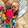 Jaxson is registered to the contest to win money with this photo: baby, baby_seat, basketball, blanket, child, colorful, cute, feet, floor, happy, holding, indoor, infant, person, play, sandals, smile, tile, toy, young