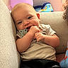 Jaxson joined the competition — help win amazing prizes! baby, balloon, blanket, child, clothing, comfortable, couch, cozy, cute, happy, home, indoor, infant, pacifier, person, portrait, relaxed, seated, smiling, toy