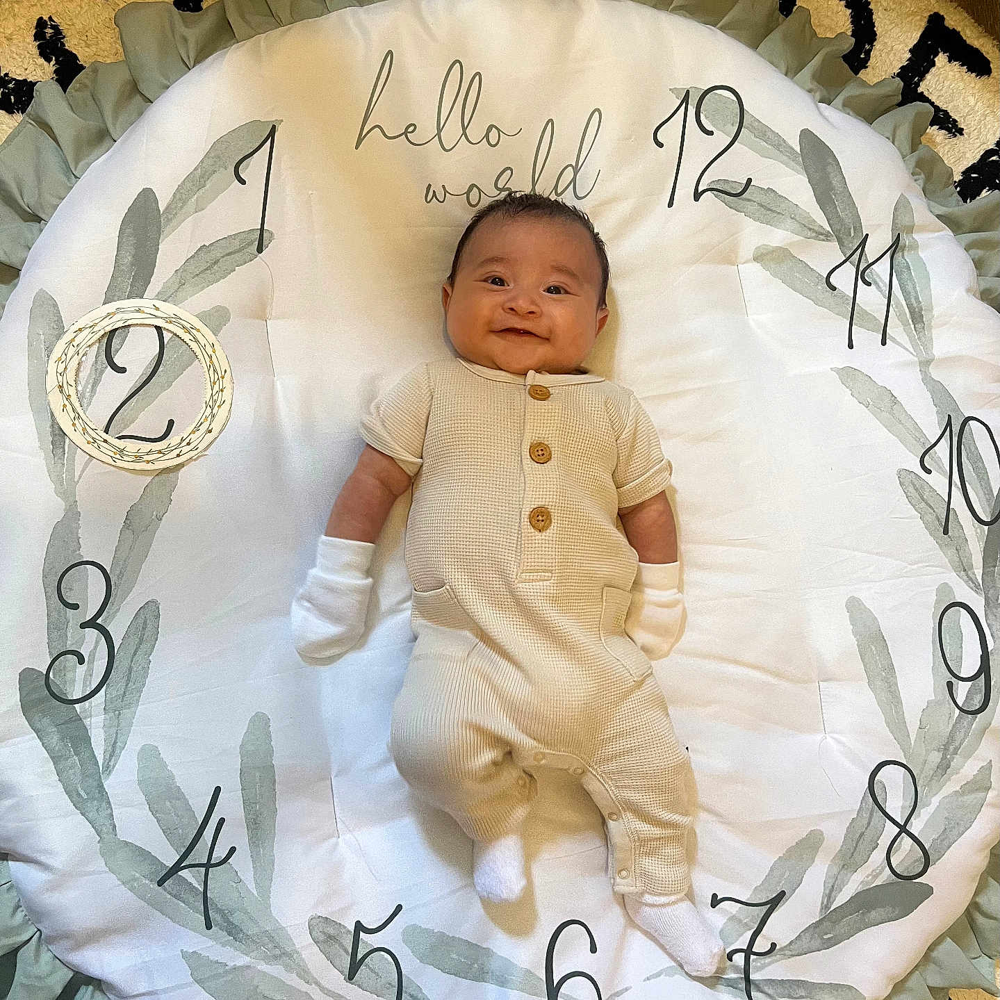 Mateo is registered to the contest to win money with this photo: baby, bed, blanket, clothing, cradle, crib, cushion, face, furniture, glove, head, homedecor, hosiery, infantbed, newborn, person, photography, portrait, sock