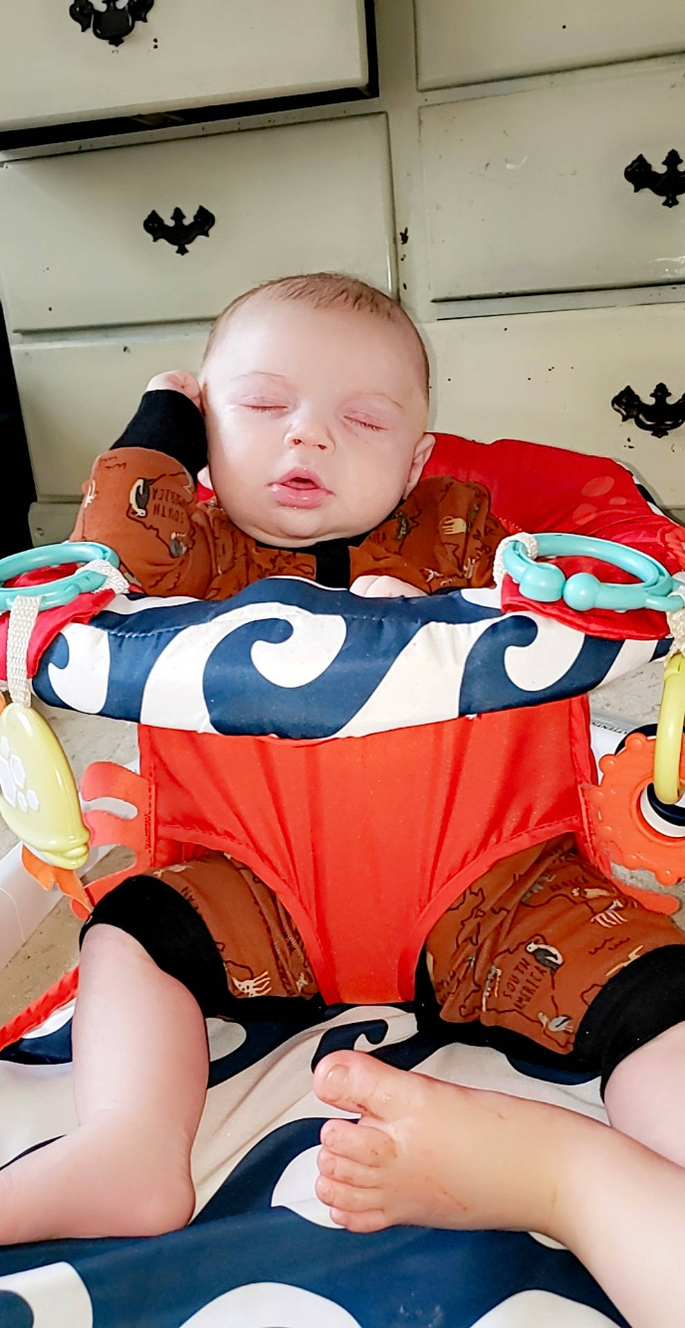 Lonnie joined the competition — help win amazing prizes! abdomen, baby, baby_products, baby_sleeping, baby_toddler_clothing, comfort, eye, finger, fun, human_leg, linens, mouth, orange, person, sitting, stuffed_toy, t_shirt, textile, thigh, toddler