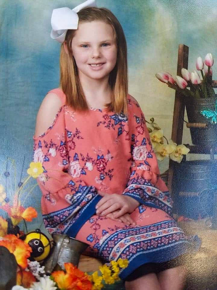 Bayleigh is registered to the contest to win money with this photo: art, child, fawn, happy, joy, person, sitting, smile