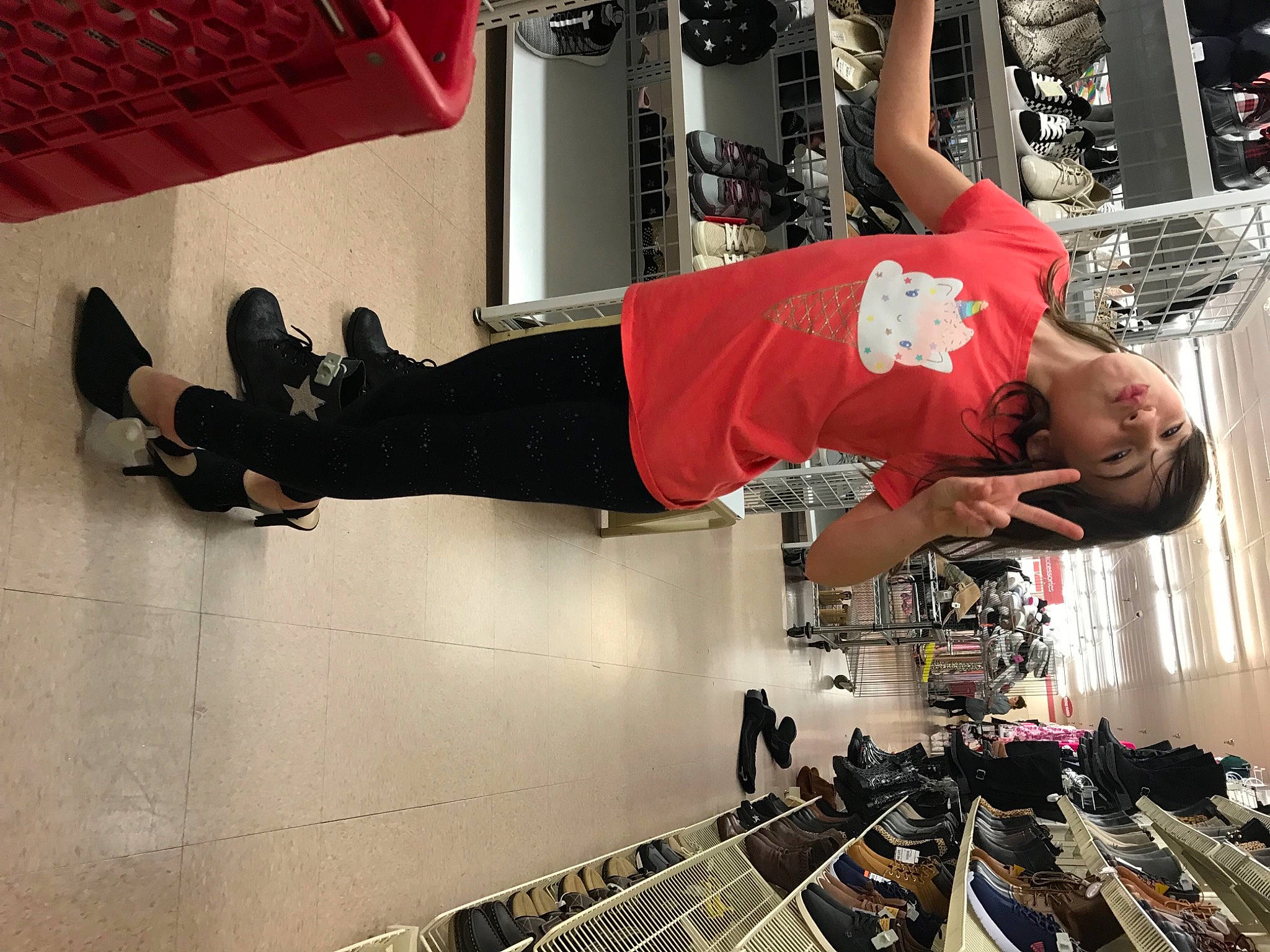 Makenzie is registered to the contest to win money with this photo: balance, boot, carmine, elbow, engineering, fun, human_leg, knee, machine, person, physical_fitness, room, shorts, sock, sportswear, t_shirt, thigh, walking_shoe