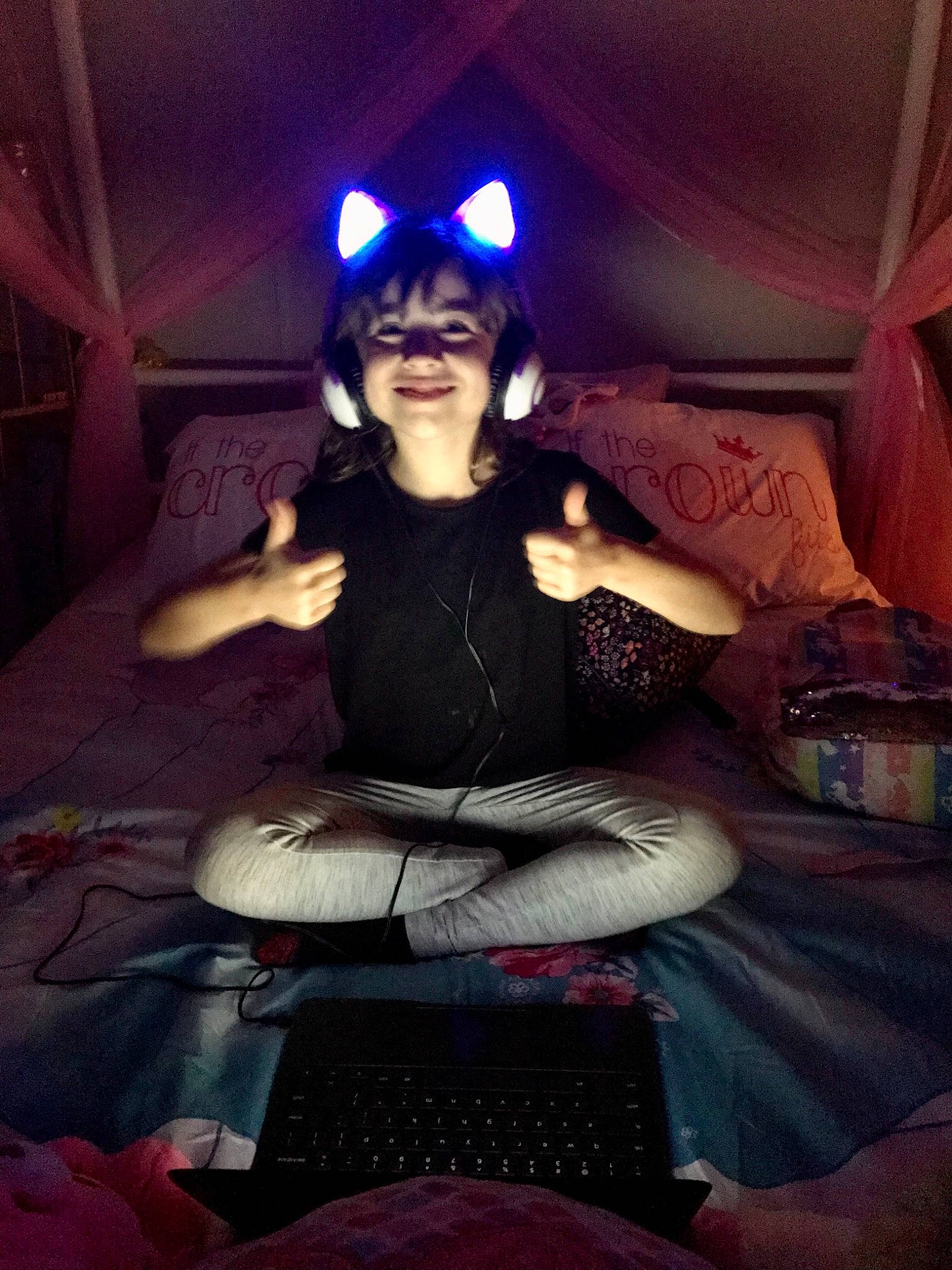 Makenzie is registered to the contest to win money with this photo: black_hair, boot, comfort, darkness, electric_blue, entertainment, event, eyewear, fashion, fashion_design, flash_photography, fun, human_leg, jewellery, joy, lap, lighting, magenta, person, purple