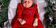 Solana joined the competition — help win amazing prizes! baby, blanket, celebration, christmas_wreath, cozy, cute, decor, festive, greenery, headband, holiday, indoors, infant, ornaments, portrait, red_dress, seasonal, silver, sleeping, small_socks