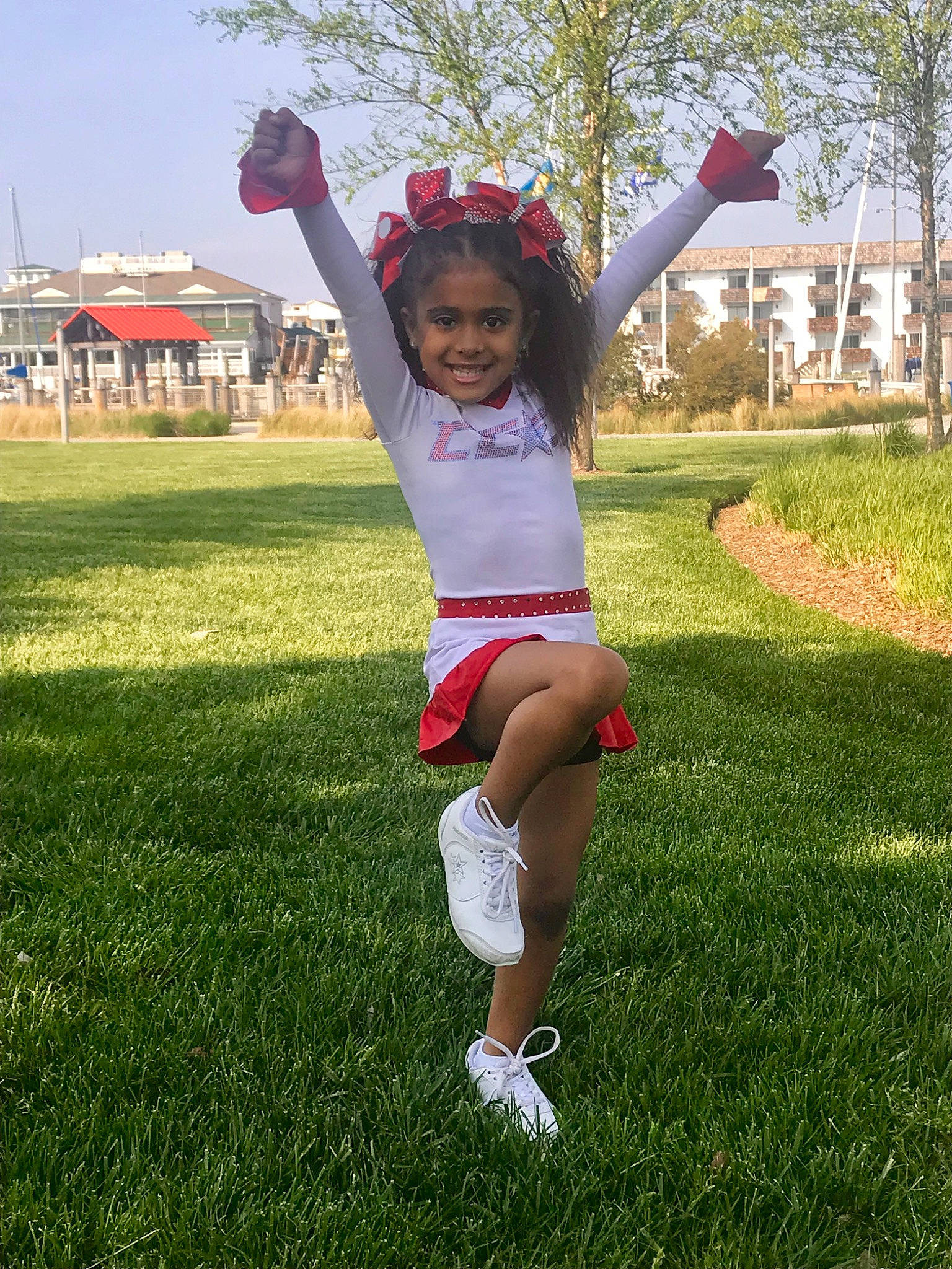 Kaileigh is registered to the contest to win money with this photo: fun, grass, happy, joint, joy, jumping, lawn, leg, meadow, person