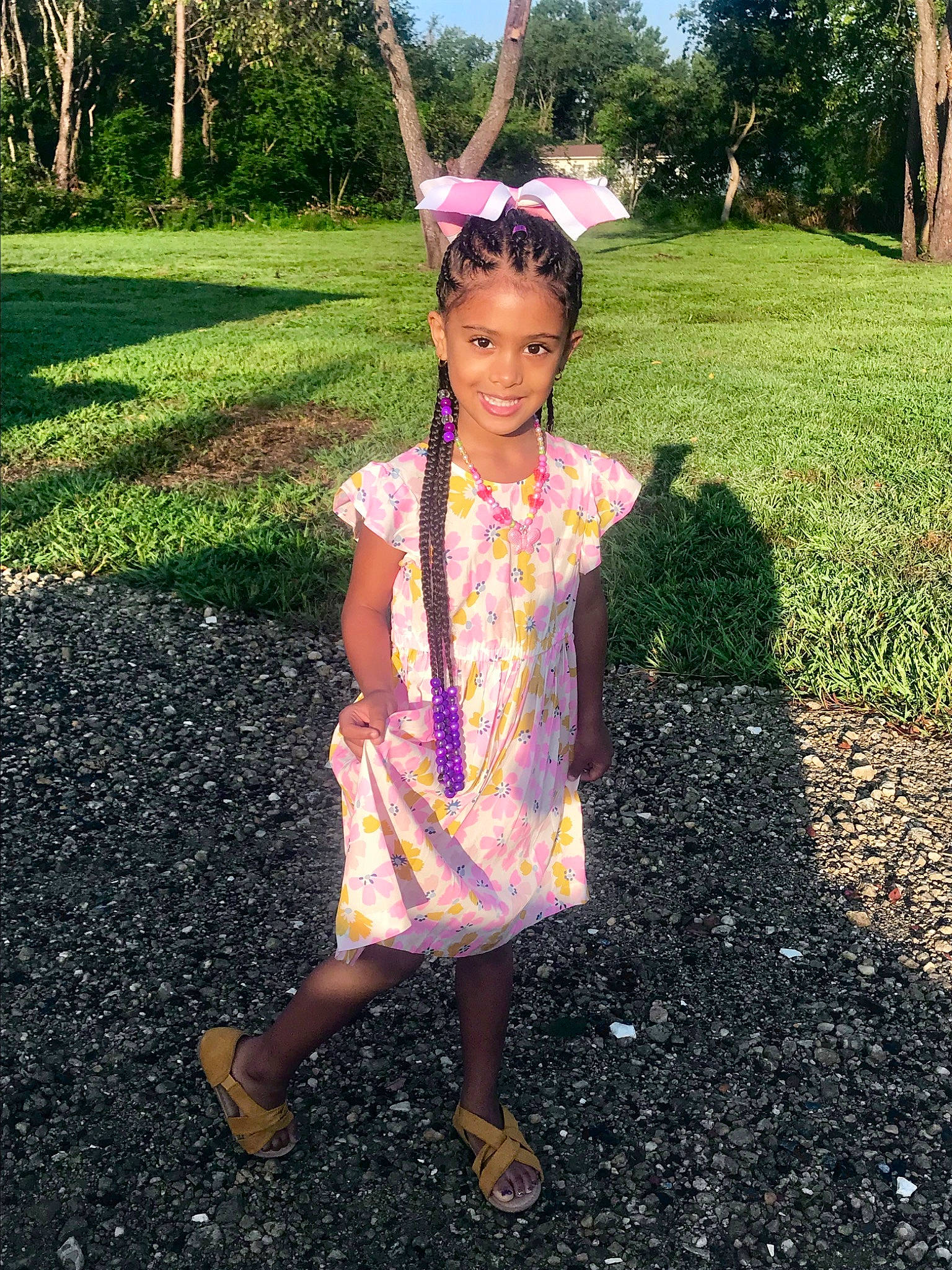 Kaileigh is registered to the contest to win money with this photo: adaptation, child, dress, flower, grass, happy, head, joy, leaf, person, pink, plant, play, purple, shoe, smile, summer, toddler, tree