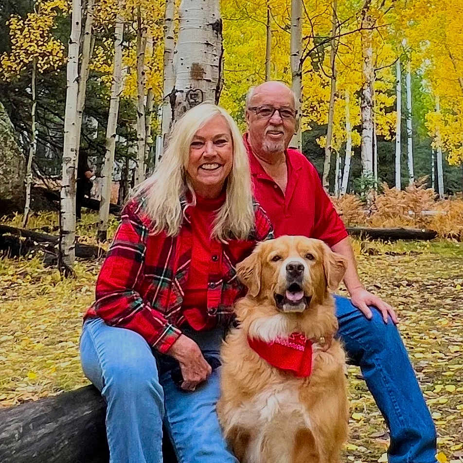 Booker is registered to the contest to win money with this photo: golden_retriever, dog, couple, people, portrait, outdoor, forest, aspen_trees, autumn, fall_colors, yellow_leaves, nature, smiling, sitting, pet, family, red_flannel, blue_jeans, woodland, outdoor_photography