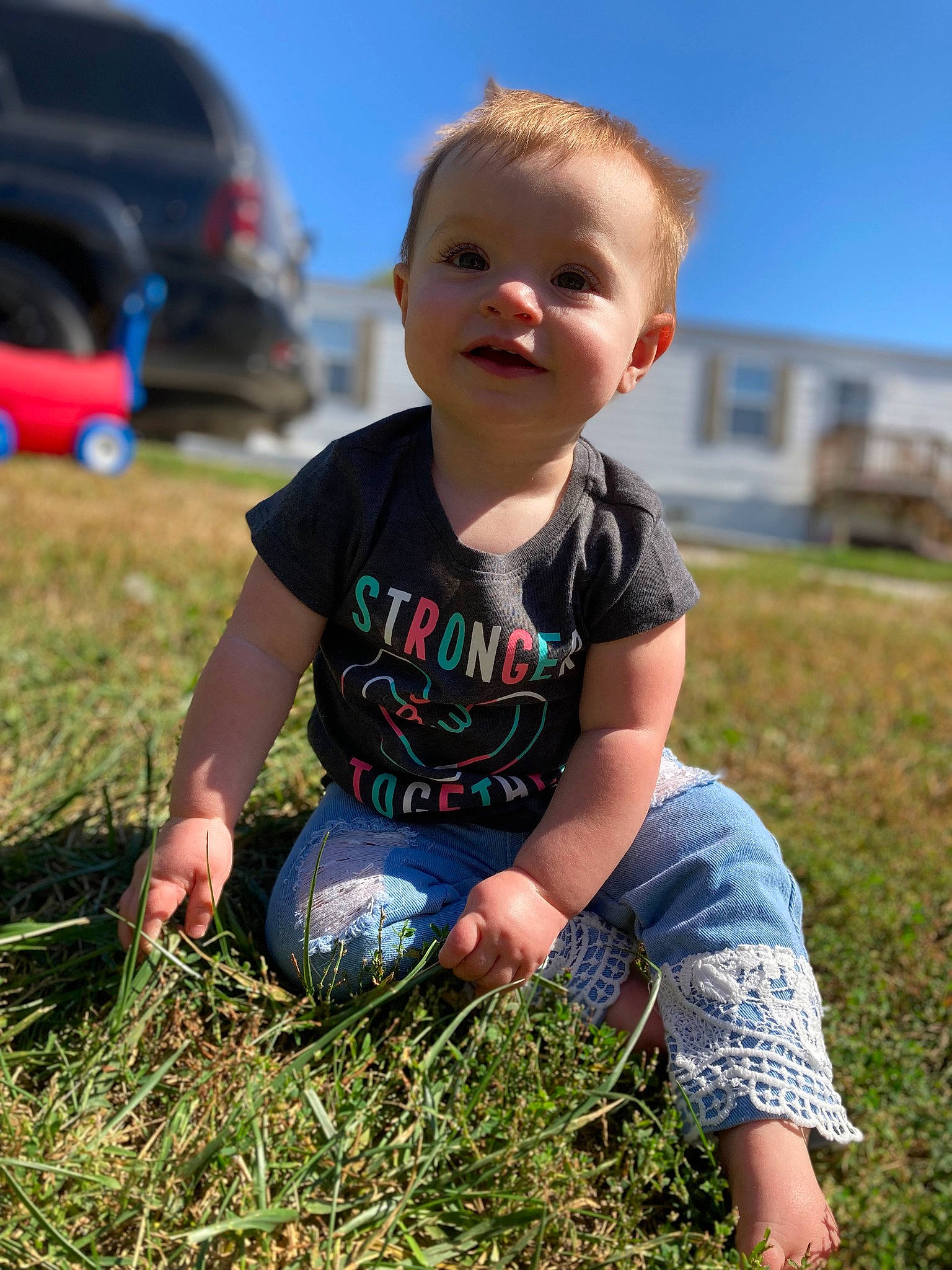 Zavaya joined the competition — help win amazing prizes! baby, baby_toddler_clothing, child, fun, grass, grassland, hairstyle, happy, landscape, lawn, meadow, people_in_nature, person, plant, sitting, skin, sky, summer, sunlight, t_shirt