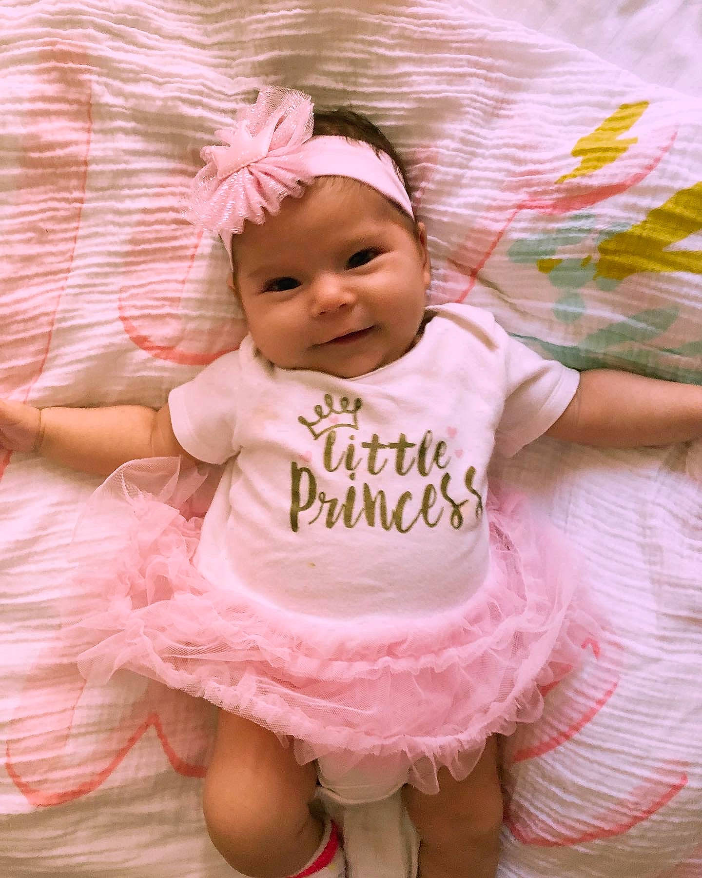 Aaliyah joined the competition — help win amazing prizes! baby, baby_products, baby_toddler_clothing, child, day_dress, face, fashion_accessory, fun, happy, headwear, magenta, pattern, peach, person, pink, purple, ruffle, skin, sleeve, smile