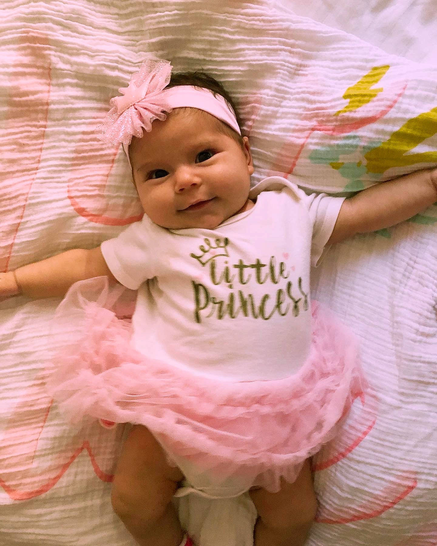 Aaliyah joined the competition — help win amazing prizes! baby, baby_toddler_clothing, cheek, child, comfort, flash_photography, fun, happy, headwear, joy, linens, magenta, pattern, person, pink, purple, ruffle, sitting, skin, sleeve