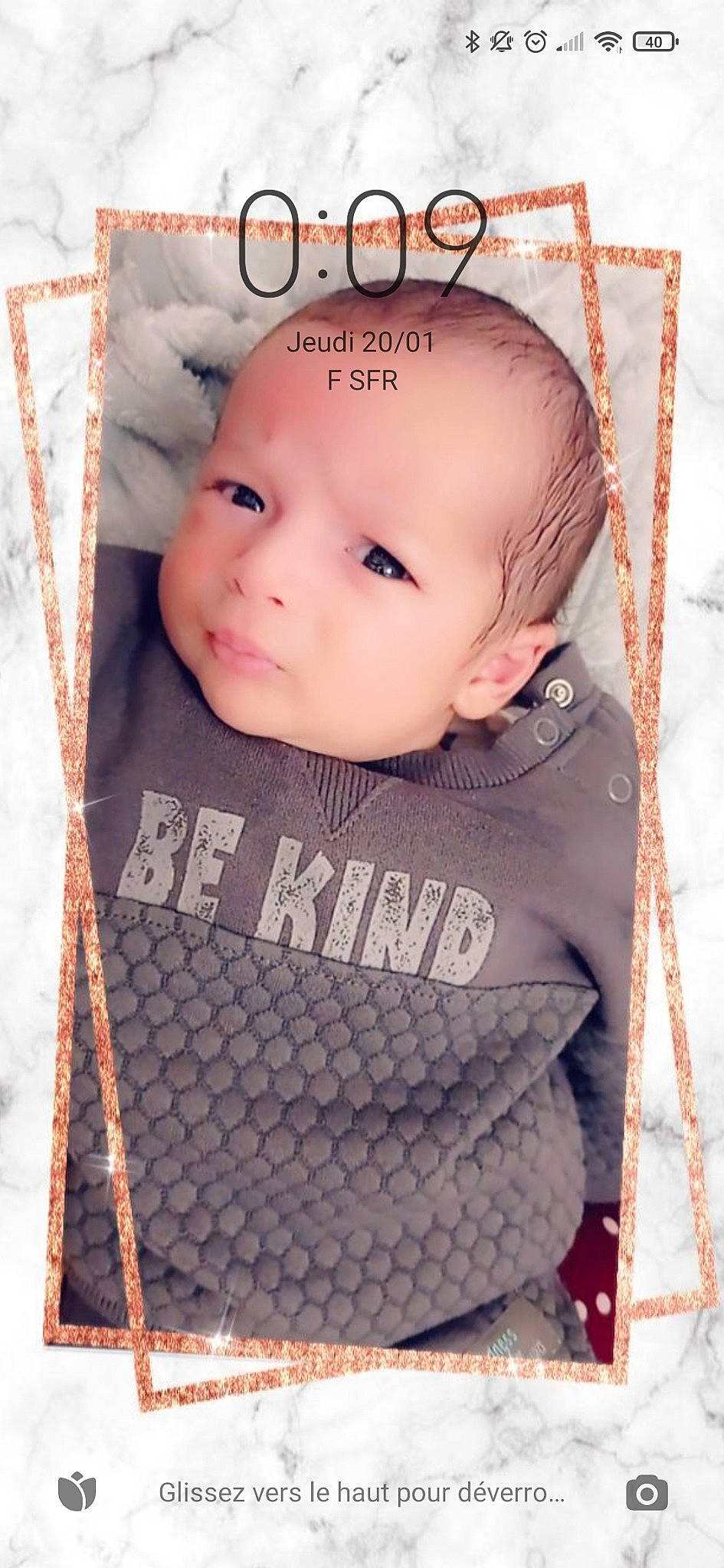 Ilyan participe au concours pour gagner de l'argent avec cette photo : baby, baby_toddler_clothing, cheek, chin, cool, eye, eyelash, head, headgear, iris, lip, organ, outerwear, person, pink, product, skin, sleeve, t_shirt, textile