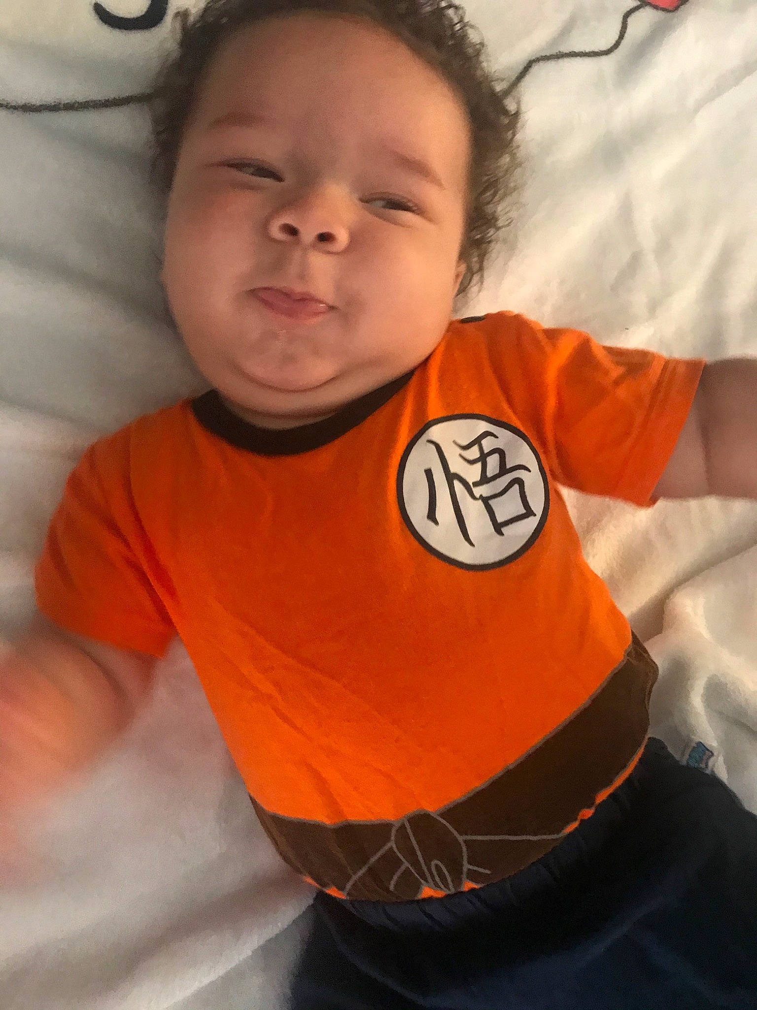 Ashton joined the competition — help win amazing prizes! arm, child, orange, person, t_shirt