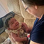 Xophia is registered to the contest to win money with this photo: adult, arm, baby, clothing, corduroy, couch, cute, face, furniture, glasses, happy, holding, human, indoor, infant, interaction, joyful, love, person, smile