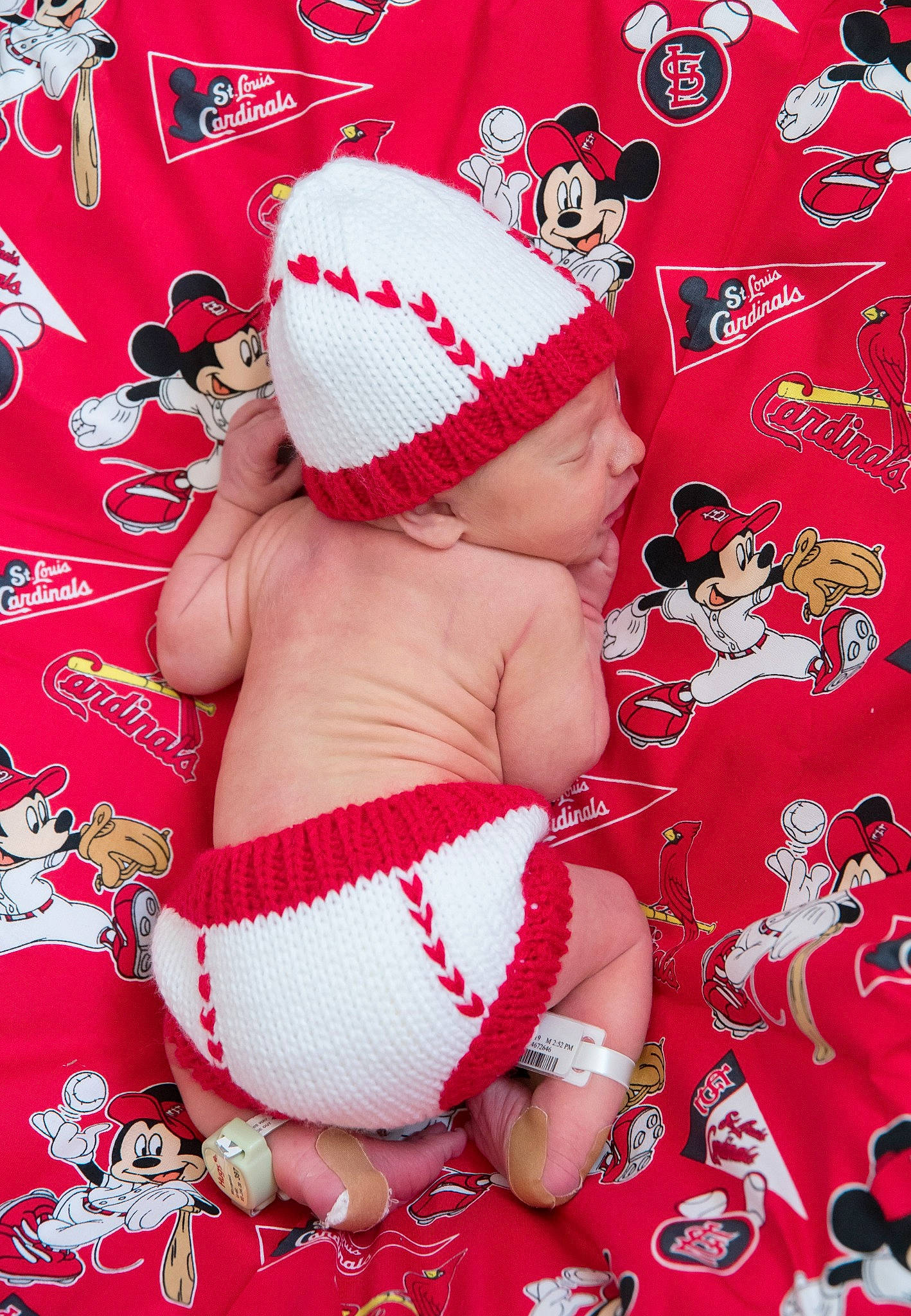 Roberto is registered to the contest to win money with this photo: art, baby, beanie, child, headgear, headwear, person, red, toddler