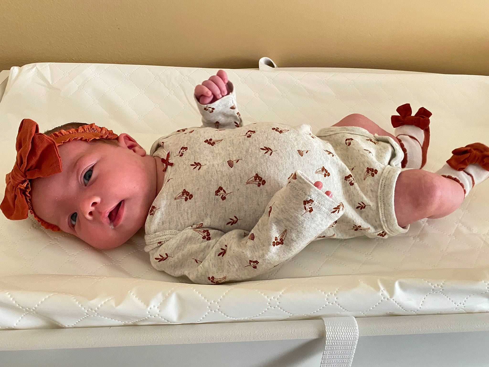 Louella is registered to the contest to win money with this photo: baby, baby_products, baby_safety, baby_sleeping, baby_toddler_clothing, bedding, child, comfort, costume_hat, fashion_accessory, hair_accessory, headband, headgear, headpiece, headwear, linens, pattern, person, pink, room