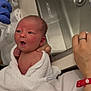 newborn, baby, towel, bath, hand, ring, hospital_wristband, sink, bathroom, person, skin, face, expression, glove, blue_glove, water, fresh, wrapped, holding, cute