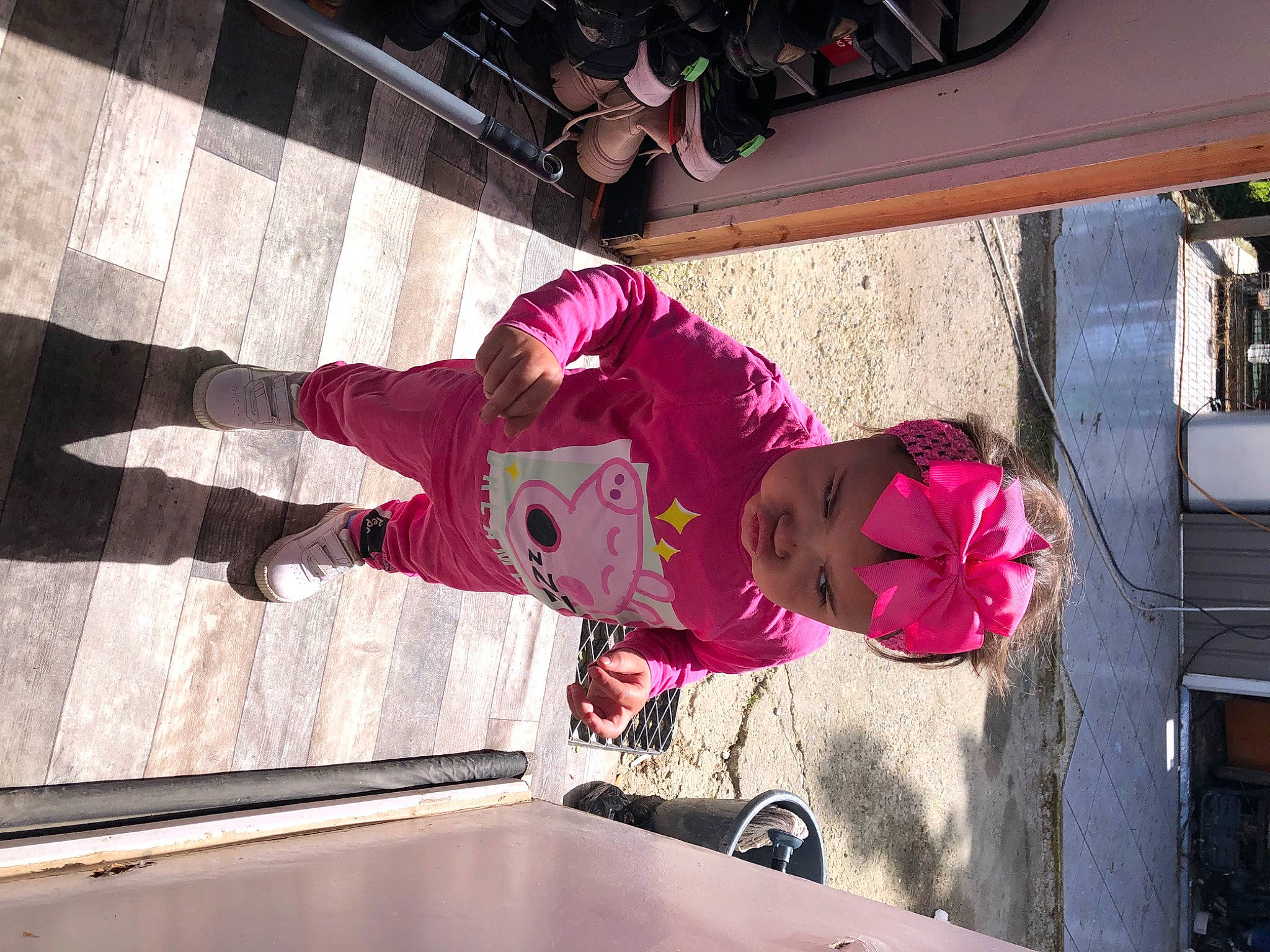 Hawaï participe au concours pour gagner de l'argent avec cette photo : building, carmine, flooring, fun, hat, house, leisure, magenta, person, pink, plant, purple, recreation, room, table, toddler, tree, walking_shoe, wood