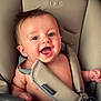 Milo participe au concours pour gagner de l'argent avec cette photo : baby, child, high_chair, smiling, happy, blue_eyes, curly_hair, infant, seatbelt, indoors, skin, cute, person, portrait, baby_seat, joy, expression, closeup, soft_light, safety_harness