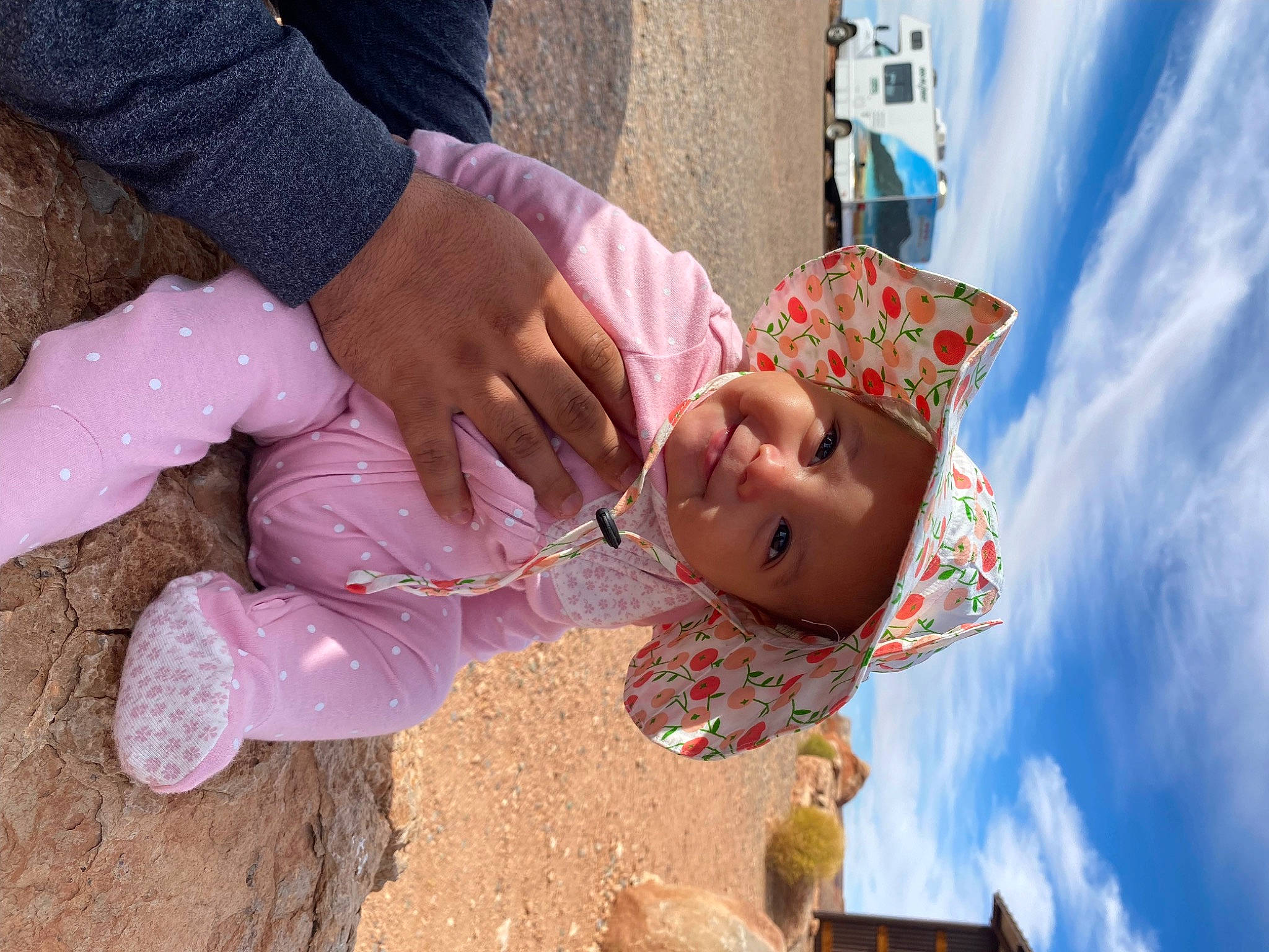 Aleyna is registered to the contest to win money with this photo: baby, child, cloud, event, fun, grass, happy, hat, headwear, joy, leisure, nail, pattern, people_in_nature, person, pink, sky, soil, toddler, tradition