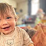 toddler, child, smiling, happy, face, hair, shirt, bear_pattern, indoors, blurred_background, cozy, cute, person, portrait, young_child, clothing, home, bright_eyes, casual, infant
