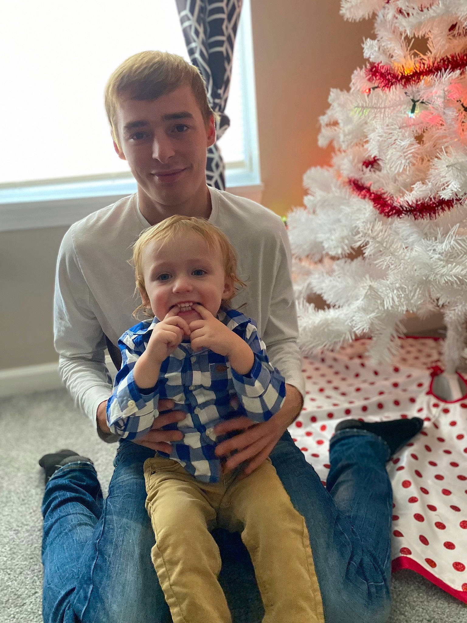 Lyric joined the competition — help win amazing prizes! child, christmas_ornament, christmas_tree, comfort, event, facial_expression, fun, hairstyle, happy, human, joy, lap, mammal, organ, people, person, photograph, sitting, smile, snapshot