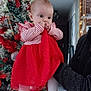 Candice a rejoint le concours — aidez-le/la à gagner de superbes lots ! baby, biting, christmas, christmasdecorations, christmastree, face, festival, head, openingpresent, person, sitting