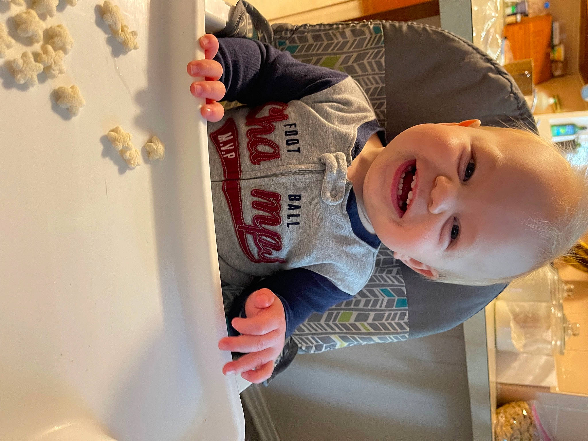 Ira is registered to the contest to win money with this photo: baby, baby_laughing, baby_toddler_clothing, child, fun, gesture, happy, hat, joy, laugh, leisure, person, plaster, play, room, sleeve, smile, t_shirt, toddler, wood