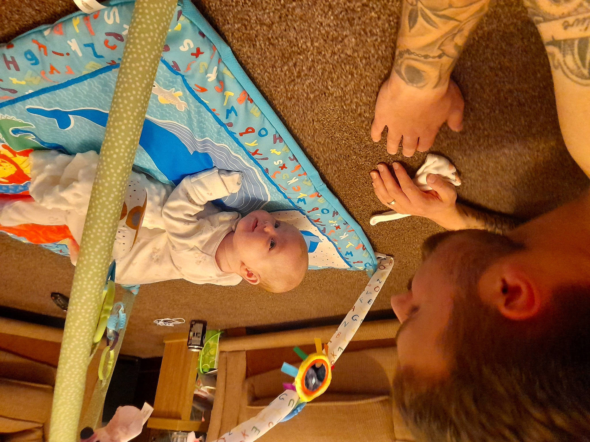 Martha is registered to the contest to win money with this photo: adaptation, art, baby, baby_products, child, flooring, fun, gesture, leisure, pattern, person, play, product, room, sharing, snapshot, textile, toddler, vacation, visual_arts