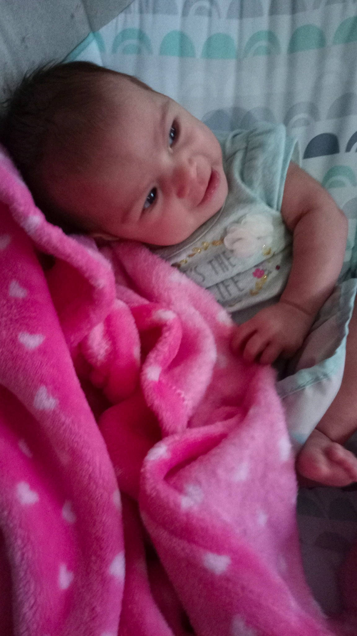 Evee is registered to the contest to win money with this photo: baby, baby_toddler_clothing, cheek, comfort, drinkware, ear, face, facial_expression, finger, gesture, hand, human_body, lip, mouth, nail, nose, person, pink, skin, thumb