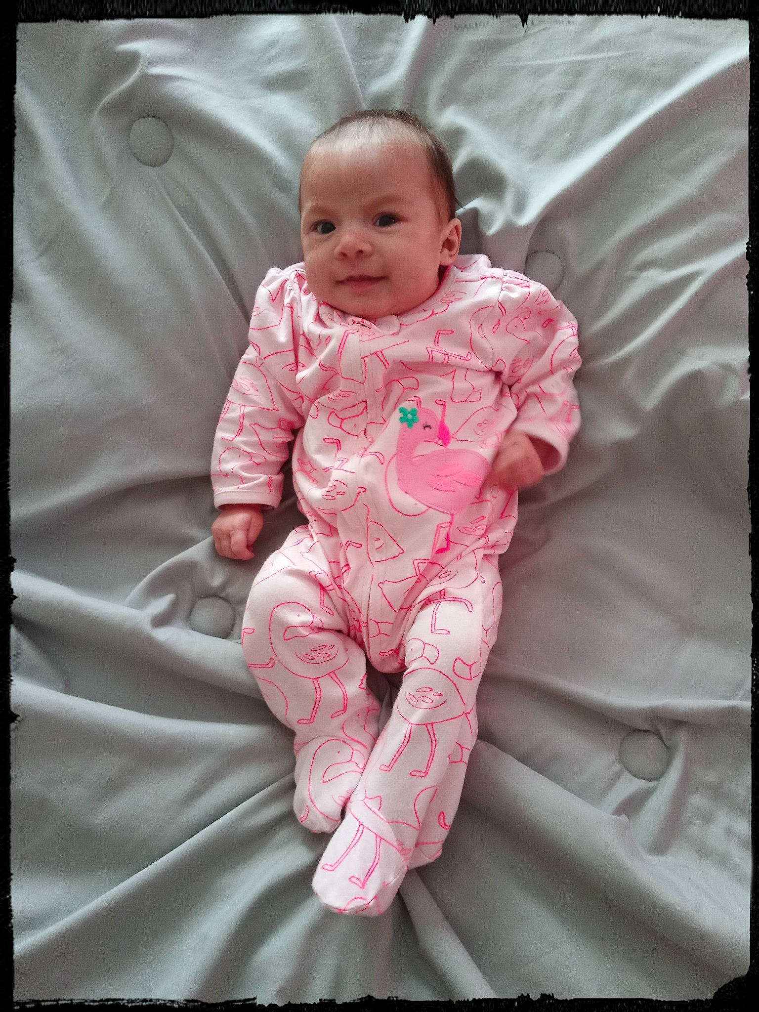 Evee is registered to the contest to win money with this photo: baby, baby_products, baby_toddler_clothing, beauty, child, comfort, flash_photography, flesh, happy, linens, magenta, pattern, peach, person, pink, rectangle, room, sitting, sleeve, smile