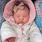 Mimikwaeh is registered to the contest to win money with this photo: baby, sleeping, infant, hood, headband, bow, blanket, pink, white, clothing, cute, cozy, soft, peaceful, child, portrait, closeup, warm, bundle, newborn